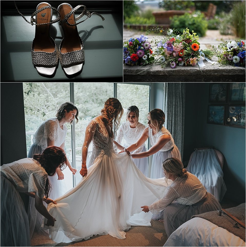 Bride getting into her wedding dress