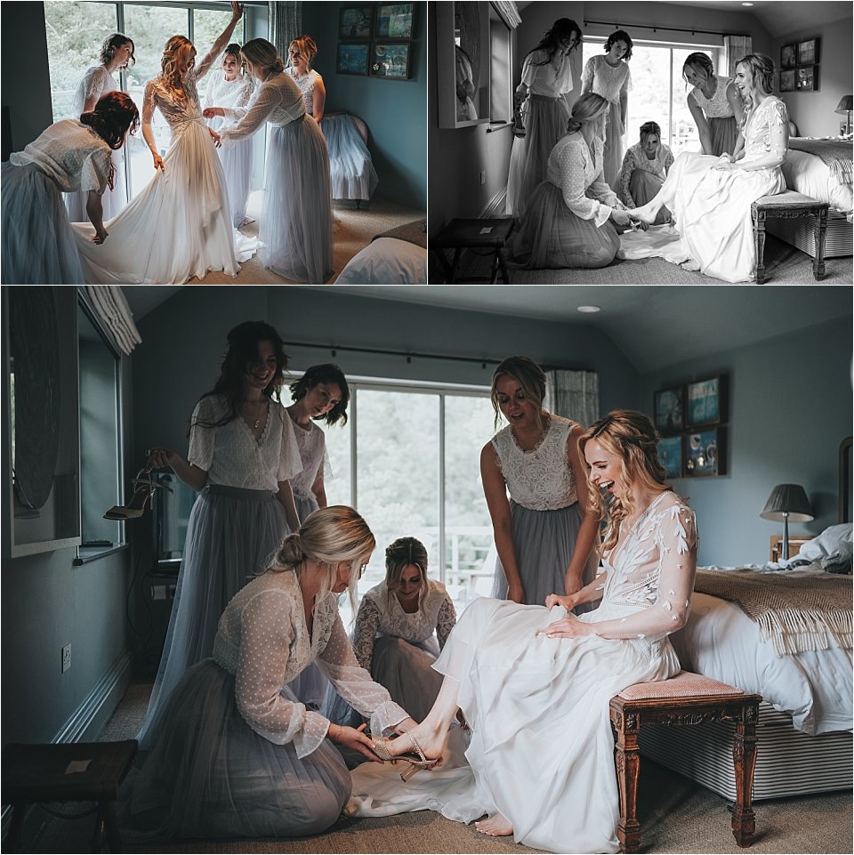 Bride having her shoes put on